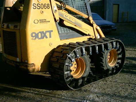 tracks or tires on skid steer|bobcat rubber tracks over tires.